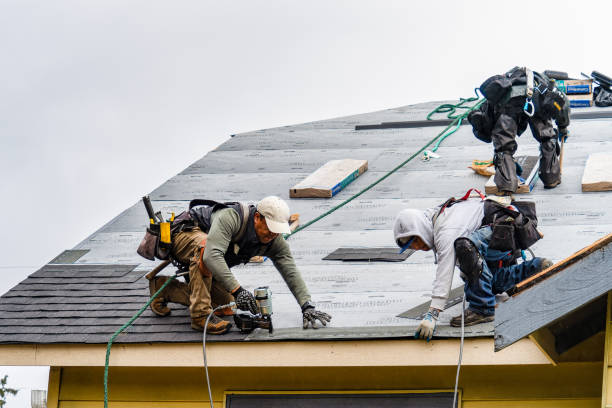 Professional Roofing technician working in Hampton, NH